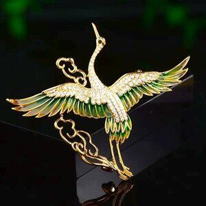 Elegant Gold and Green Crane Brooch